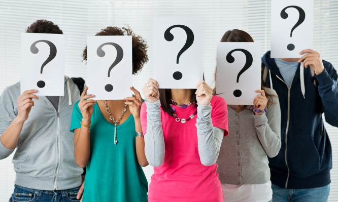 Students Hiding There Face With Question Mark Sign, uncertainty of their future concept