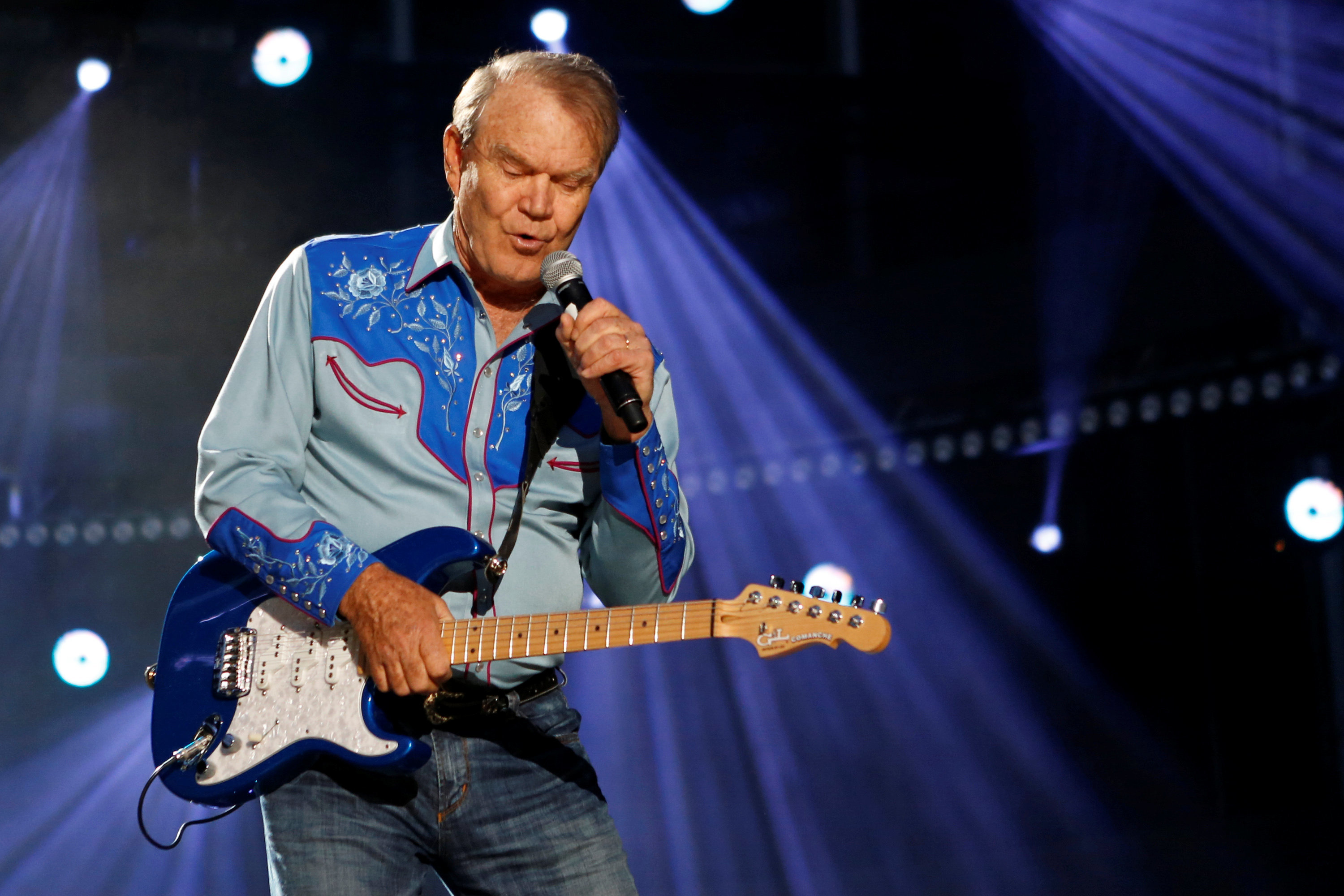 FILE PHOTO: American country music artist Glen Campbell performs during the Country Music Association (CMA) Music Festival in Nashville, Tennessee June 7, 2012. REUTERS