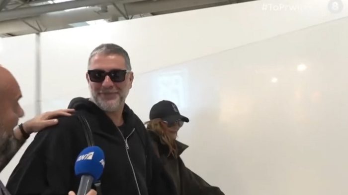 Βασίλης Μπισμπίκης και Δέσποινα Βανδή χέρι χέρι στο αεροδρόμιο πριν πετάξουν για την Ιταλία